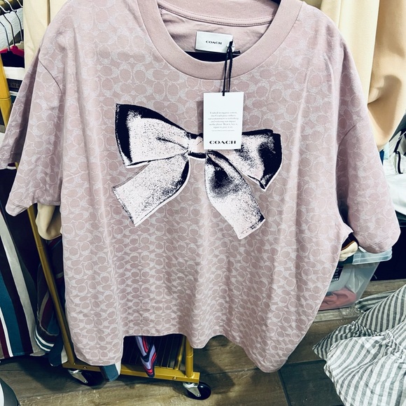 Coach Tops - Coach Women's Light Pink Bow Graphic Tee